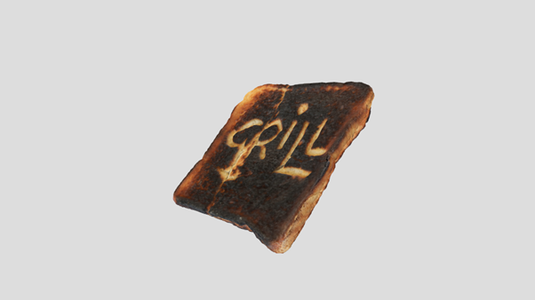 Burnt piece of toast with the word 'grill' scratched into it