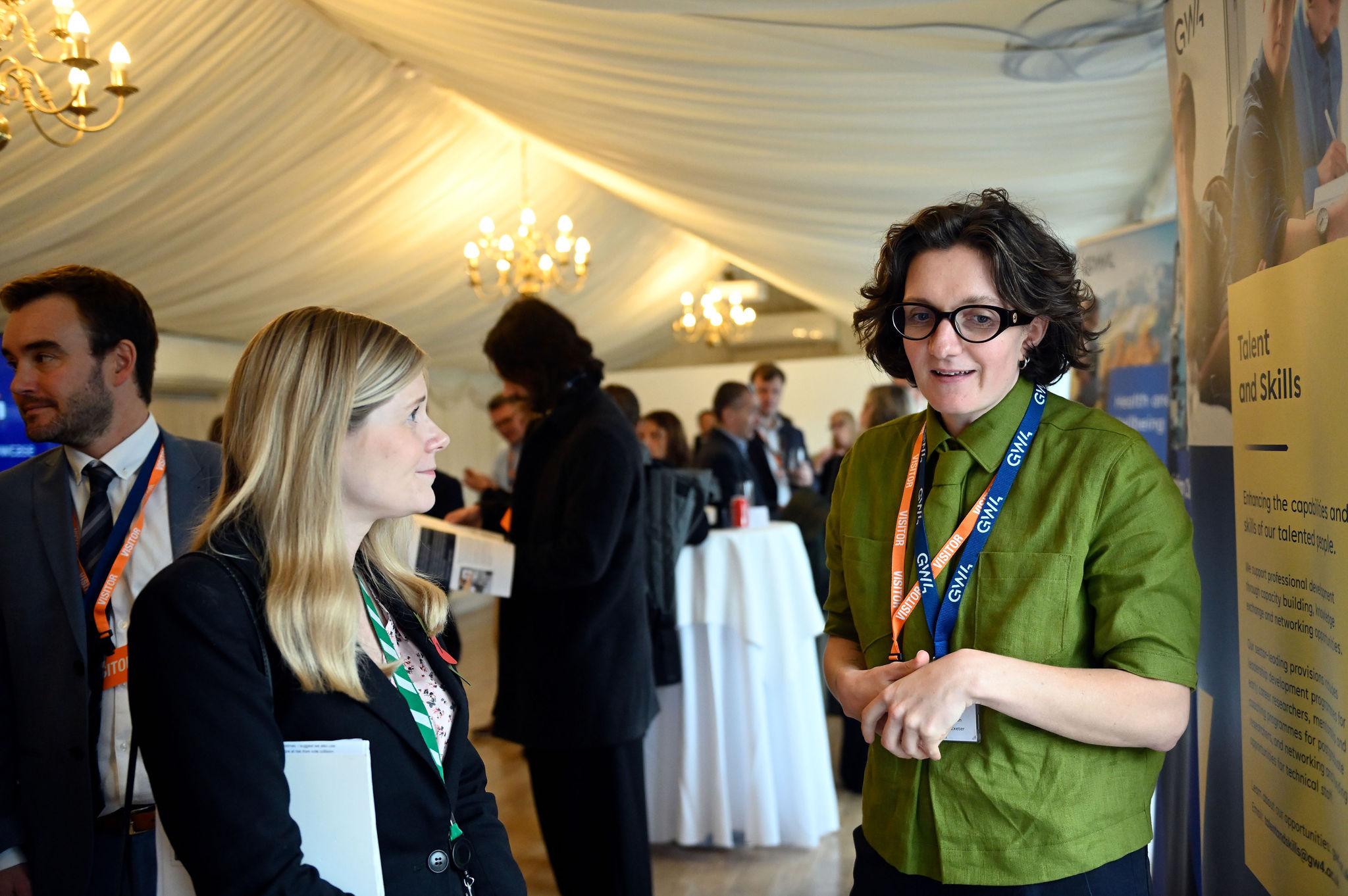 The image shows Claire Hazelgrove MP (Event Sponsor and MP for Filton & Bradley Stoke) speaking with Dr Lucy McFadzean, member of the Transforming Homes project.