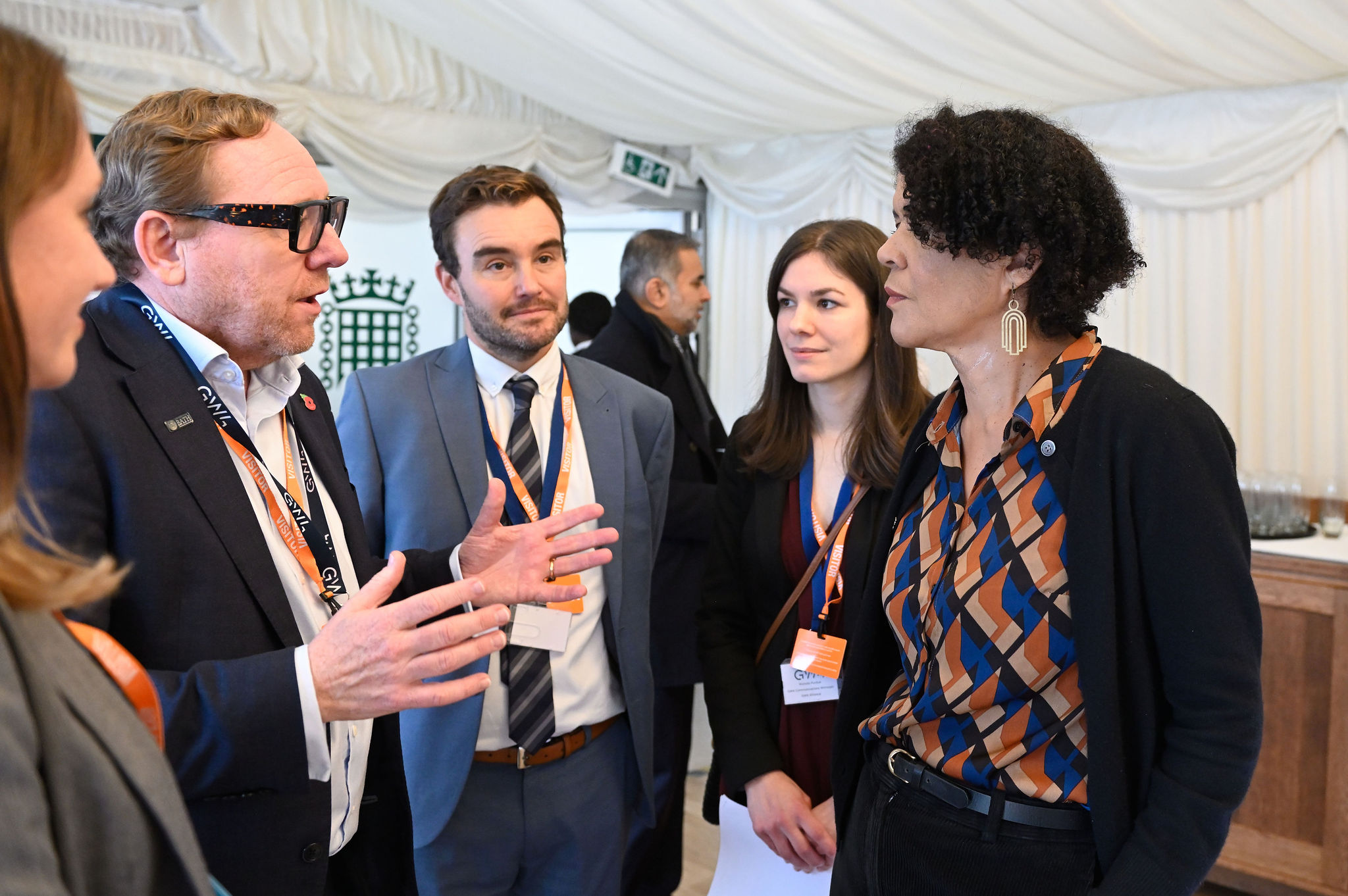 The image shows Professor Phil Taylor (Vice-Chancellor and President of the University of Bath), greeting Dame Chi Onwurah MP (Chair of the Science, Innovation and Technology Select Committee. Also featured are Andy Dunne, Head of Public Affairs at the University of Bath and Nichola Purdue, GW4 Communications Manager.